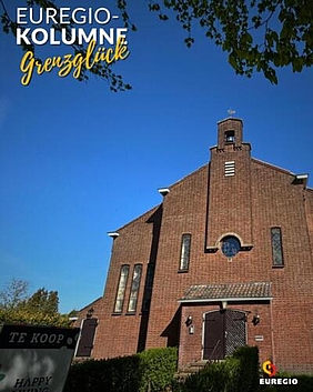 Von außen sieht die Deta-Kirche in Enschede unverändert aus. Innen sind Appartements entstanden. Foto: Martin Borck.